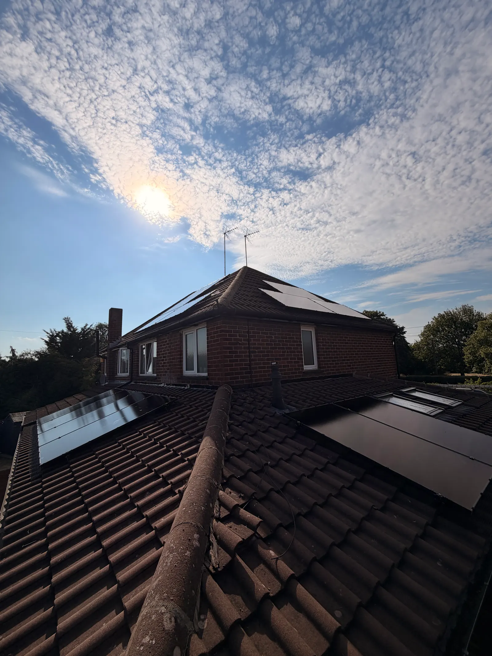 Completed ECONEXIS solar installation in Leighton Buzzard against the evening sky